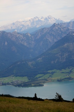 The Dachstein mountain range in the distance above Lake Wolfgangsee. 