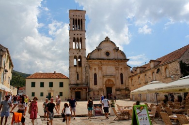 The old bell tower and church at the port of Hvar. 