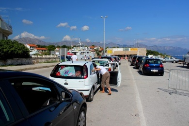 Our daily traffic jam. Only an hour and a half wait to get on the ferry. Things are looking up? 