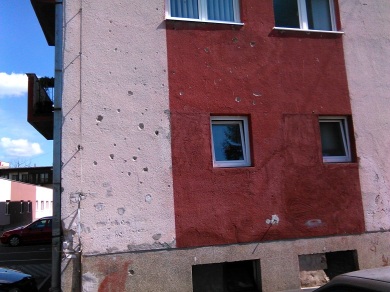 Still evidence of bullet holes in the buildings. 